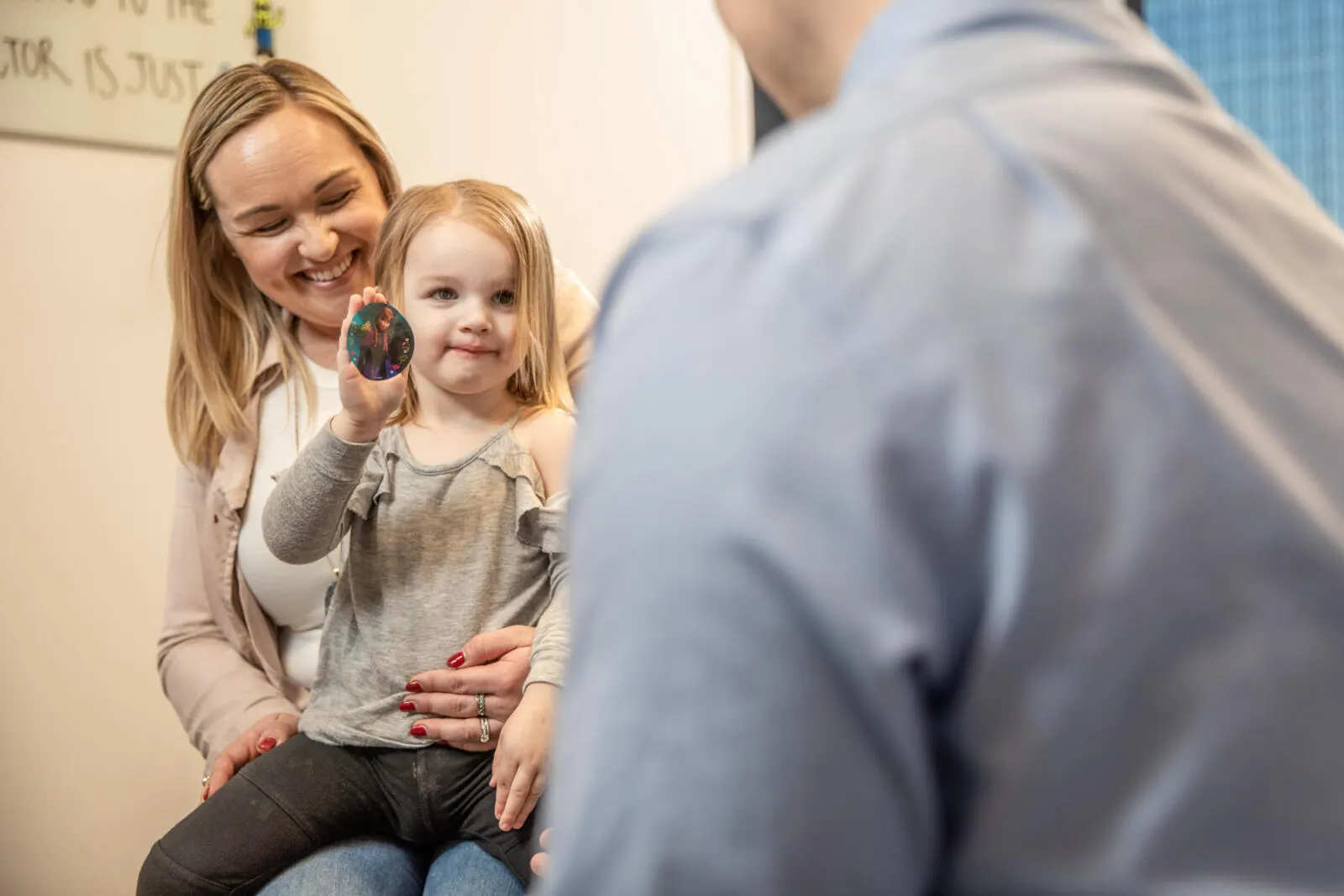 chiropractor doctor attend to pediatric care treatment