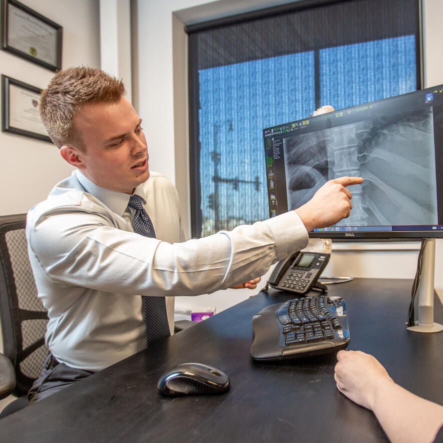 Dr. Andrew Jahne showing patient digital xray result