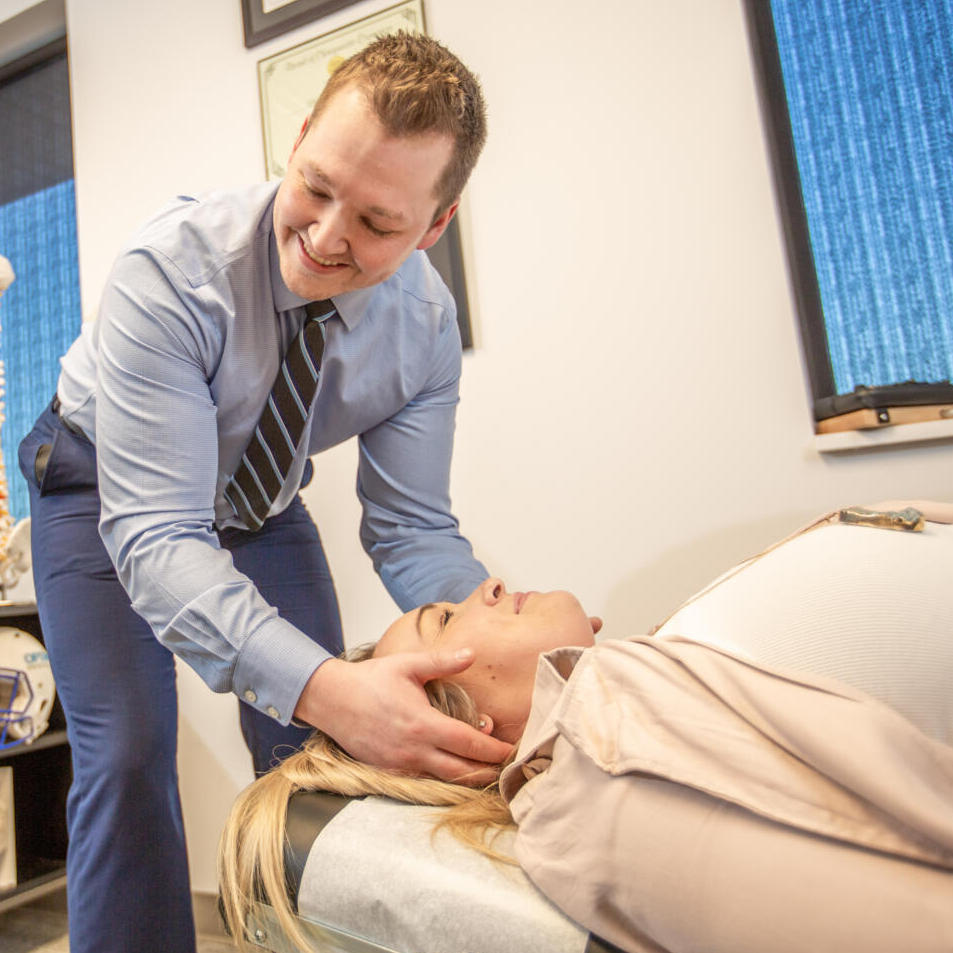 Dr. Nicholas Barney attend patients neck pain treatment