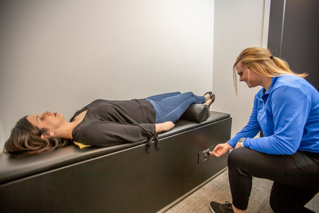 medical practitioner attend to patients intersegmental treatment