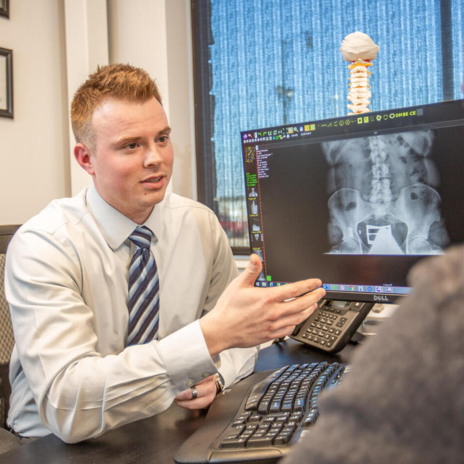 Dr. Andrew Jahner showing his patients xray result